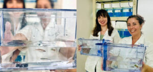 Carolina Martinez y Jimena Prieto con una pecera de peces cebra / Carolina Martinez and Jimena Prieto with a zebrafish tank